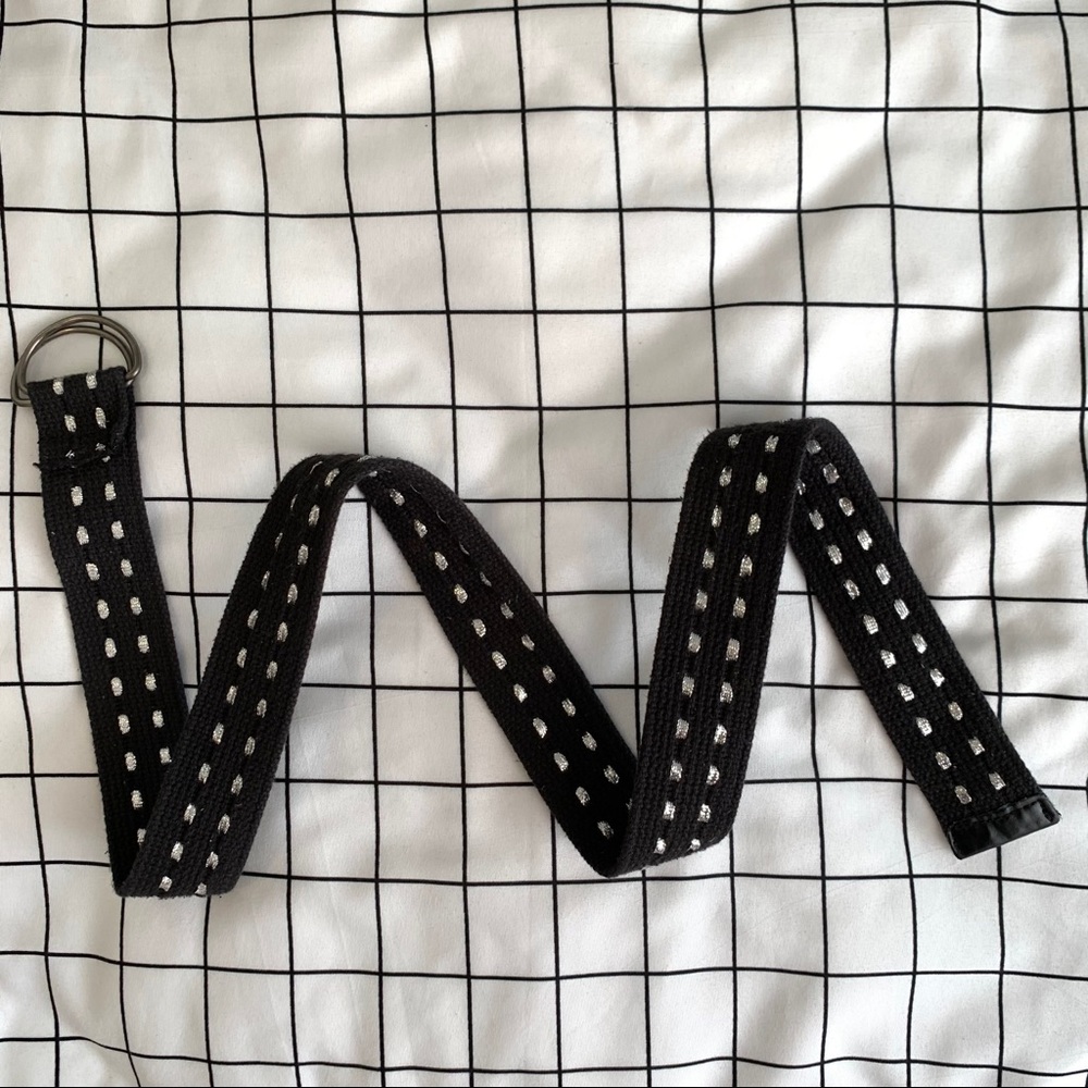 Black woven belt with silver dash accents